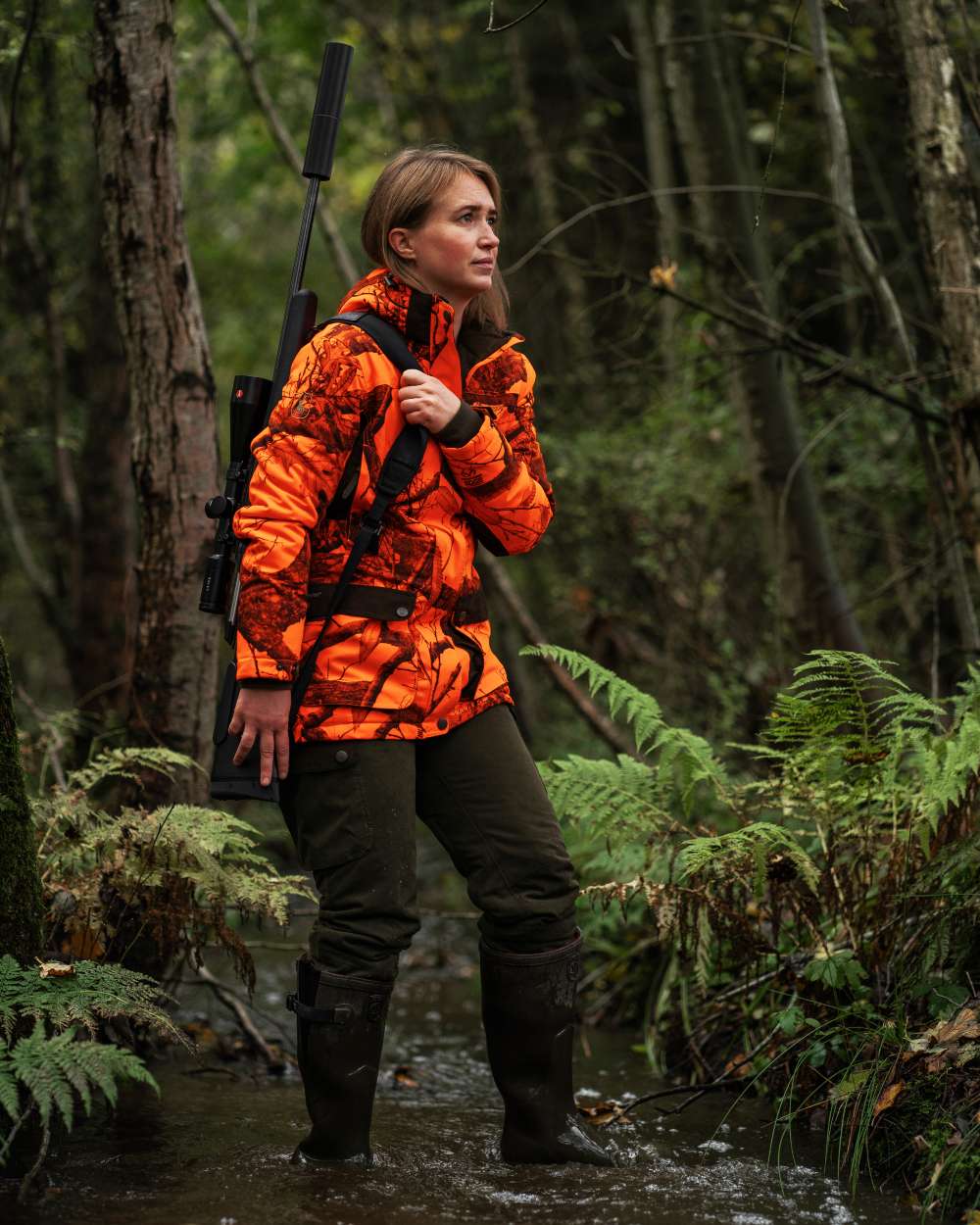 Realtree Edge Orange coloured Deerhunter Lady Eagle Winter Jacket on forest background