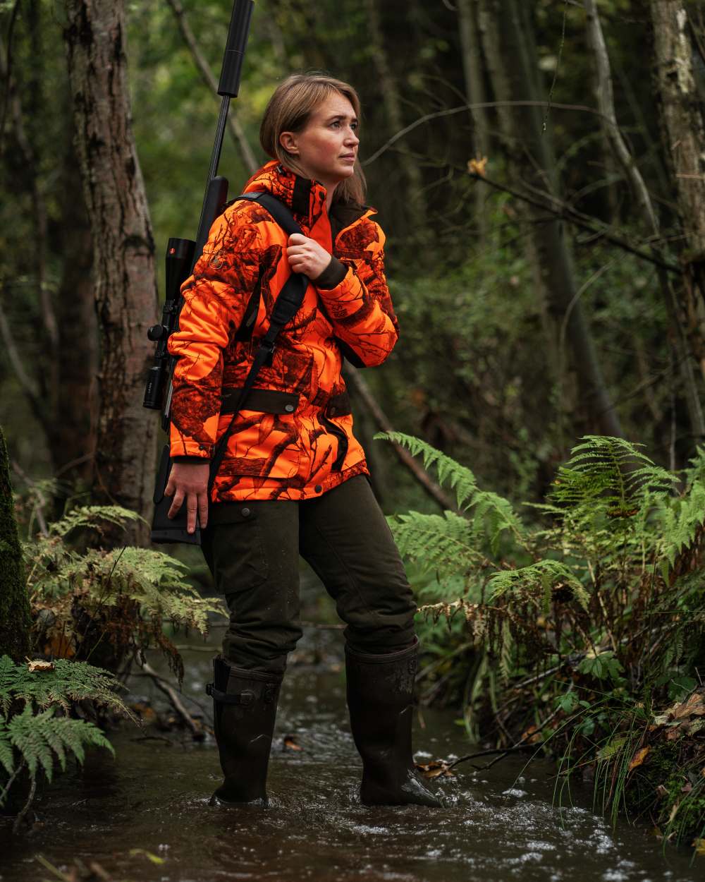 Tarmac Green coloured Deerhunter Lady Eagle Winter Trousers on forest background