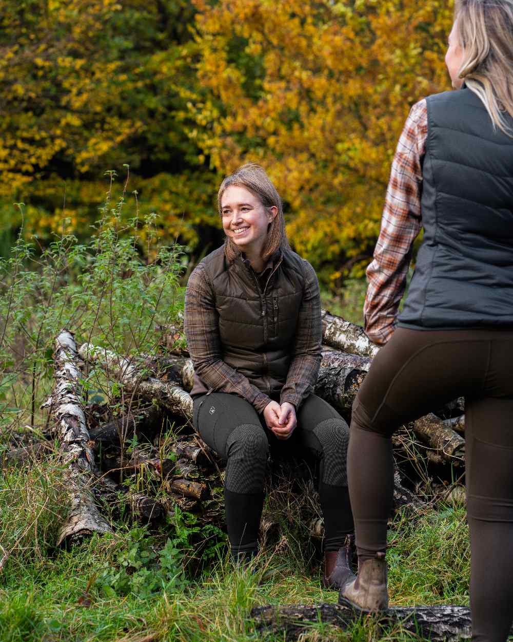 Wood Coloured Deerhunter Lady Heat Padded Waistcoat on forest background