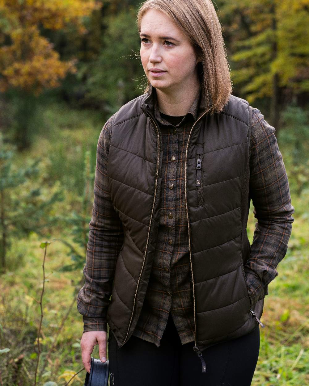 Wood Coloured Deerhunter Lady Heat Padded Waistcoat on forest background