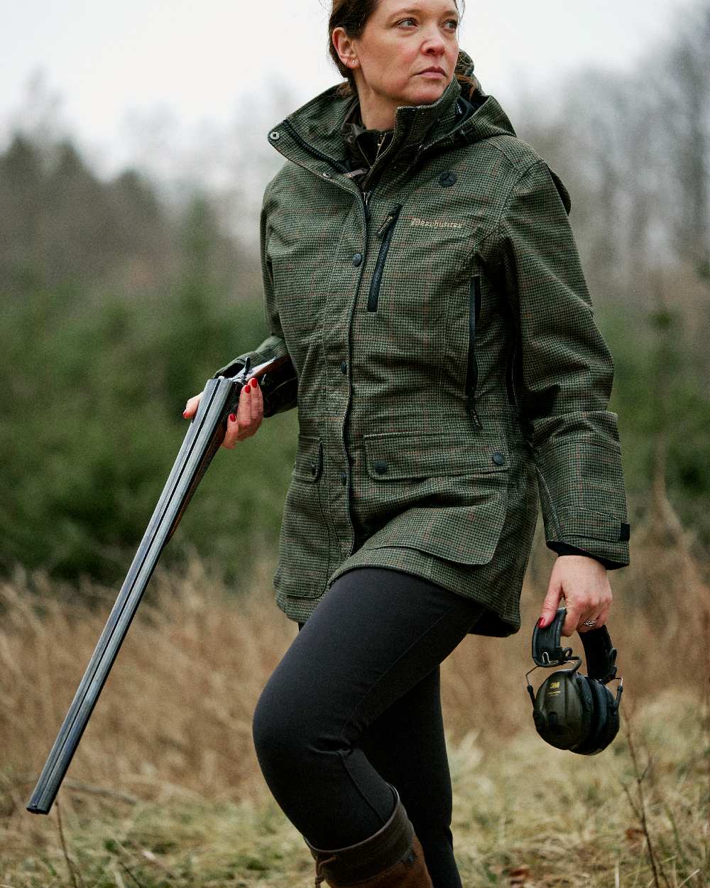 Black coloured Deerhunter Lady Hunting Tights on grassy background