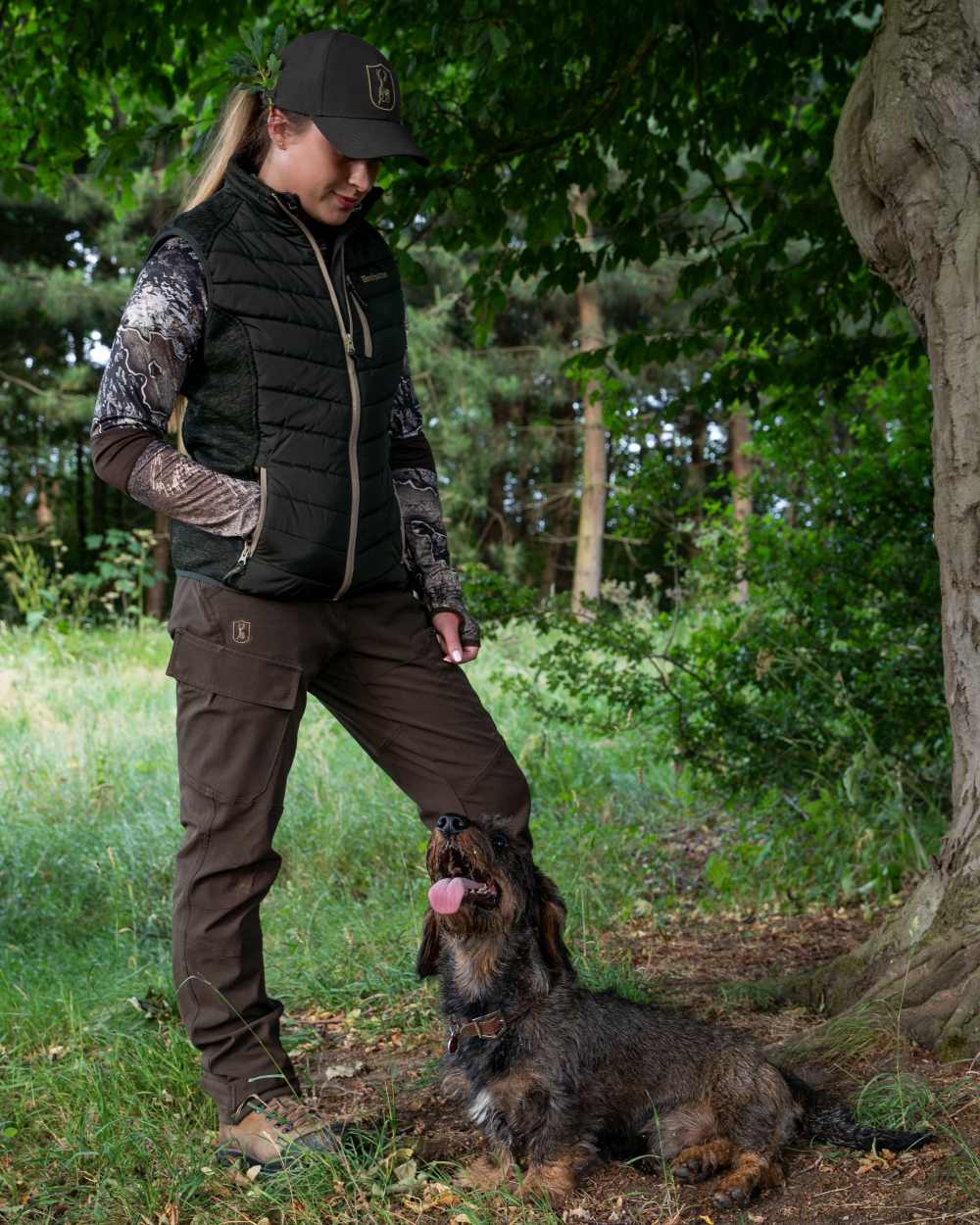 Forest Ember coloured Deerhunter Lady Moor Padded Jacket on forest background