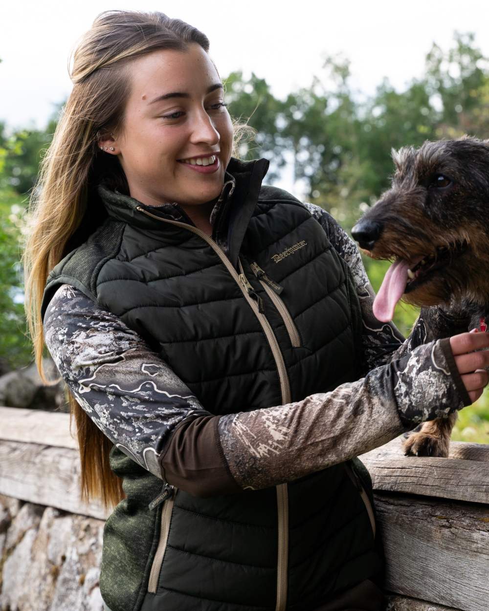 Forest Ember coloured Deerhunter Lady Moor Padded Waistcoat on forest background