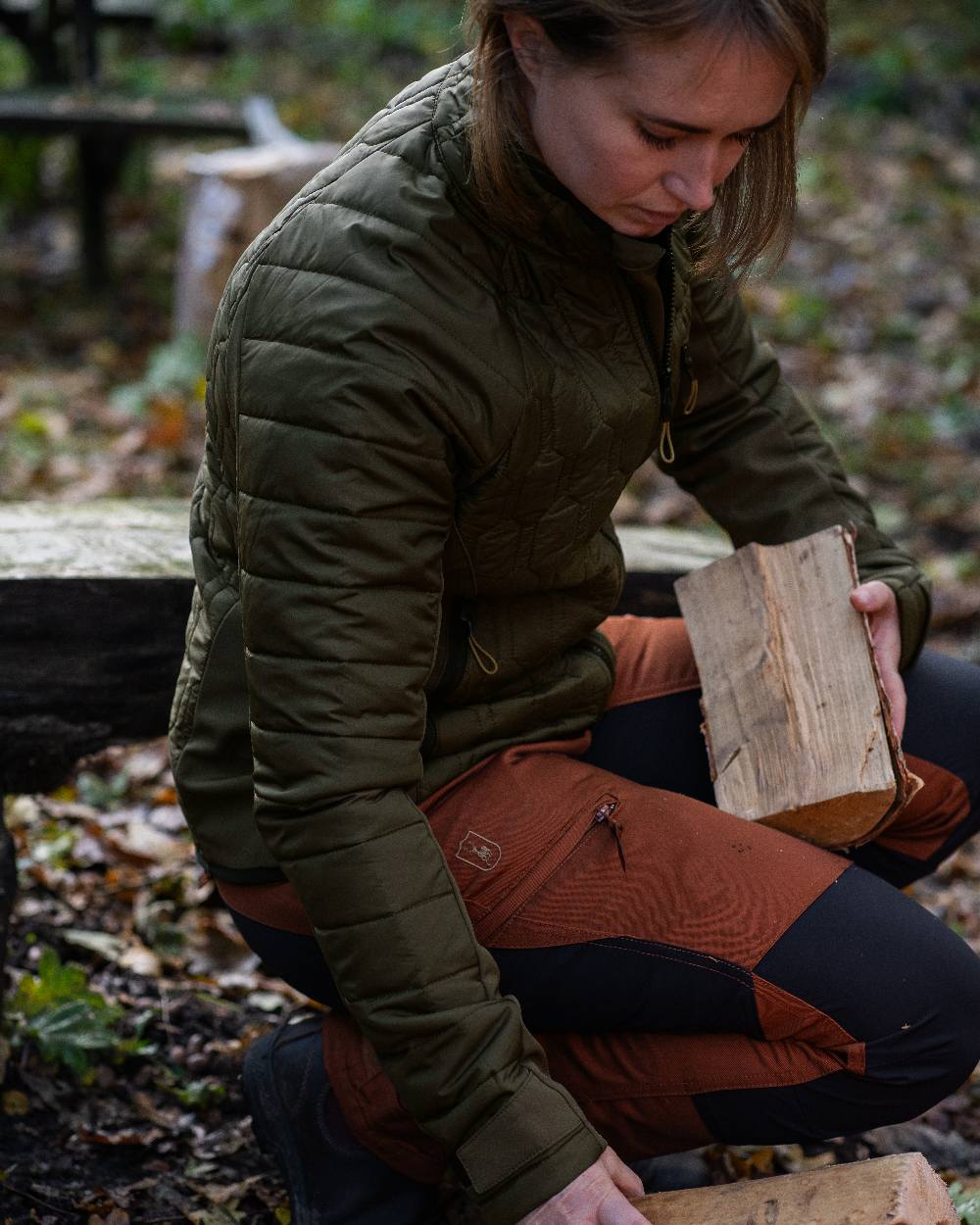 Forest Green coloured Deerhunter Lady Mossdale Quilted Jacket on forest background