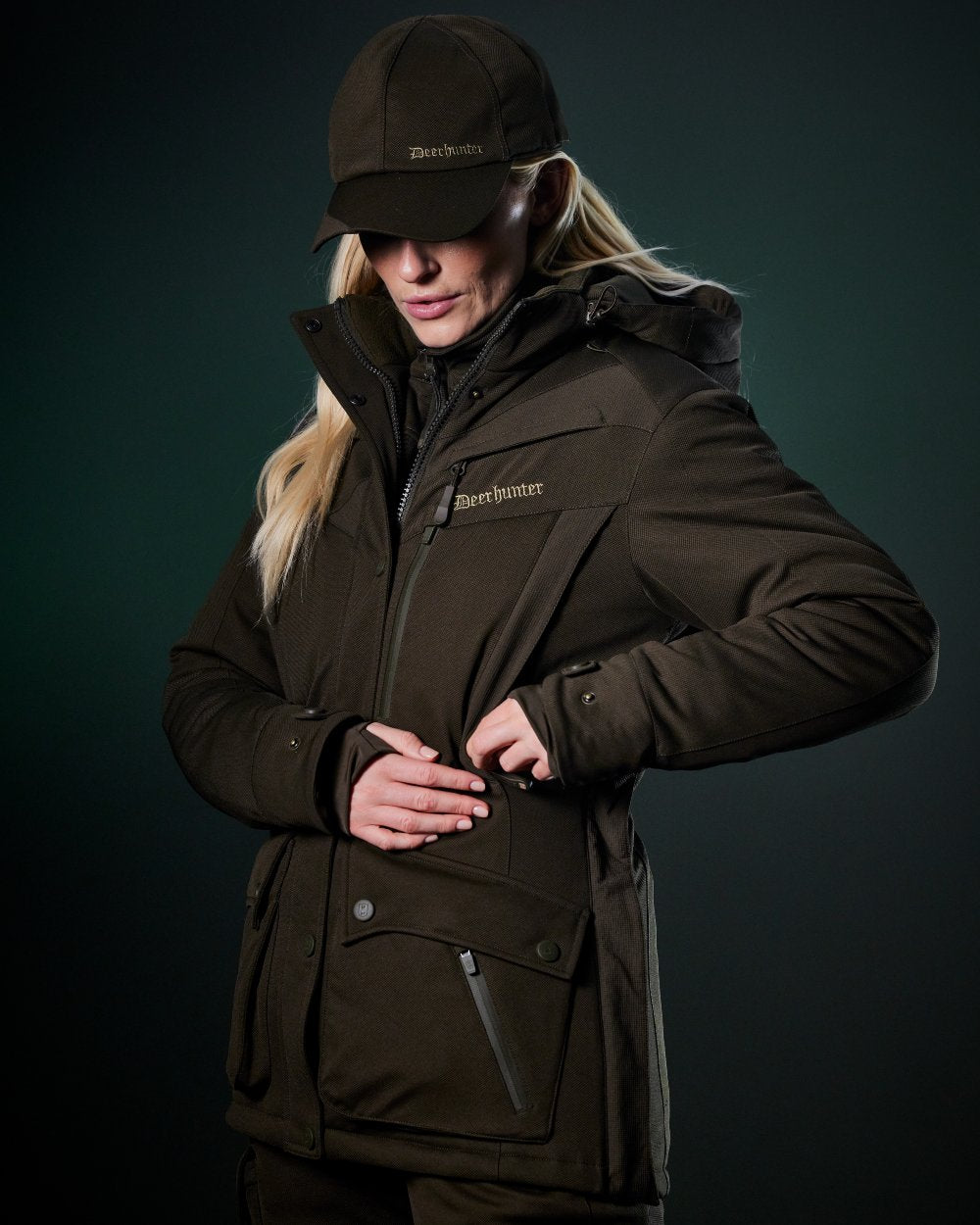 Art Green coloured Deerhunter Lady Muflon Pro Fleece Jacket on forest background