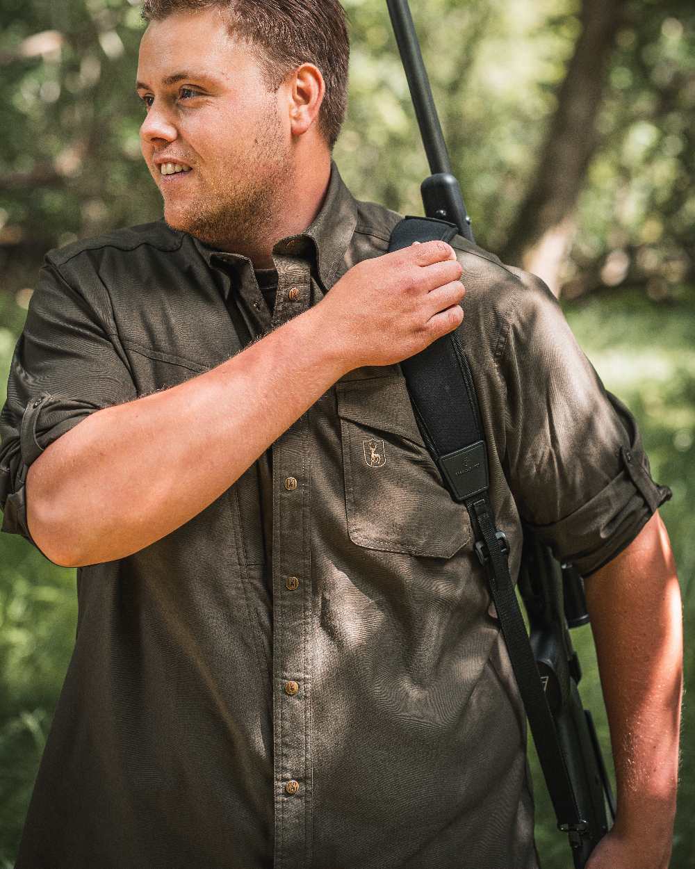 Forest Green coloured Deerhunter Matobo Shirt on blurry background