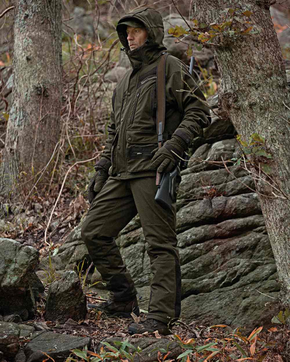 Art Green coloured Deerhunter Muflon Bib Trousers on forest background