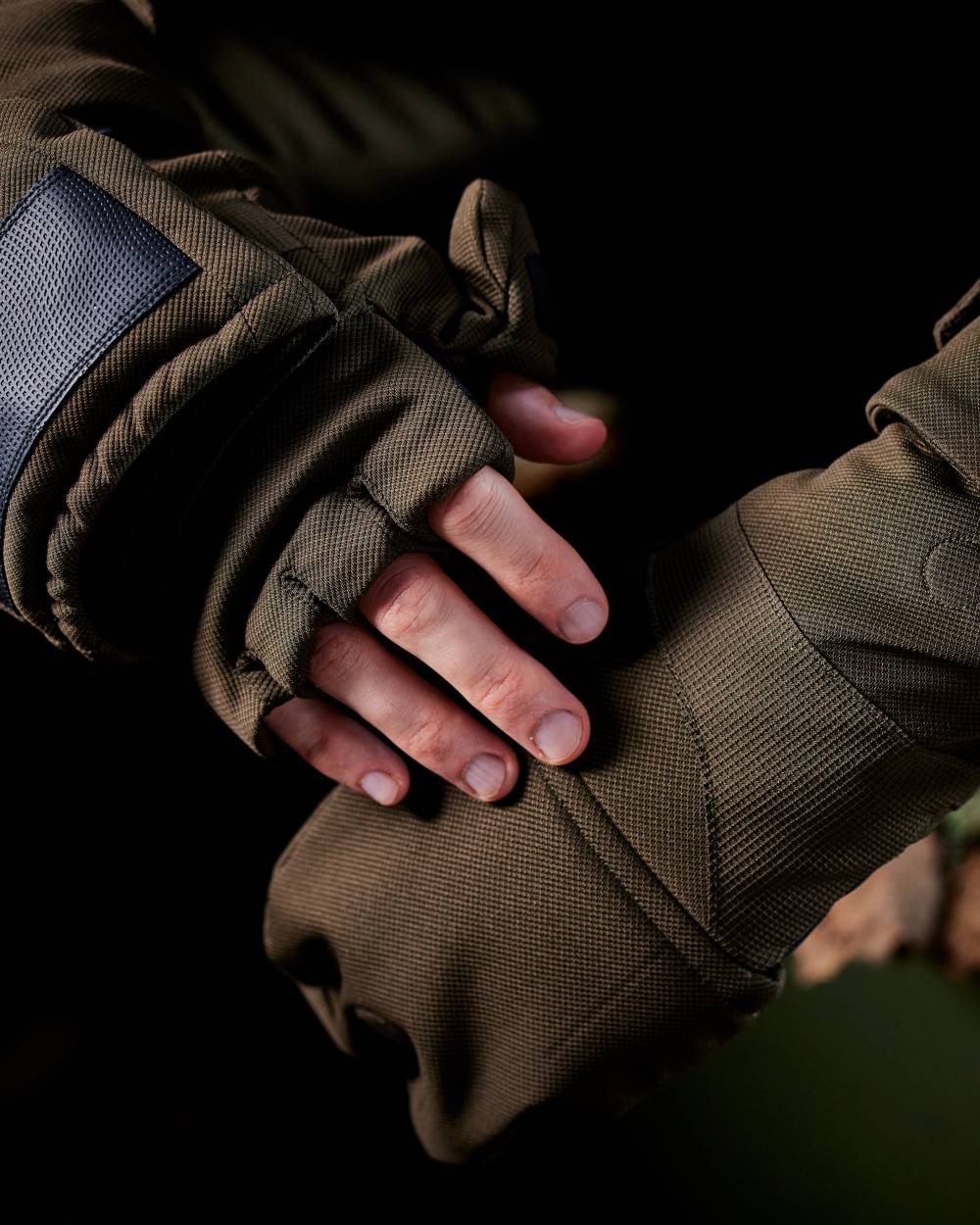 Art Green coloured Deerhunter Mens Muflon Pro Glomitts on forest background