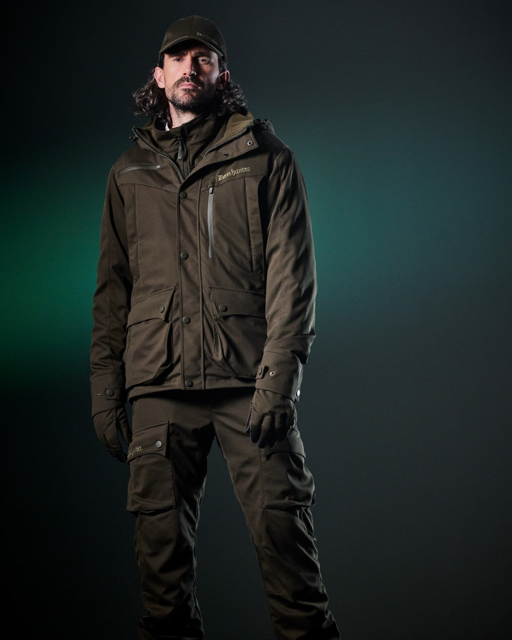 Art Green coloured Deerhunter Mens Muflon Pro Light Jacket on dark background