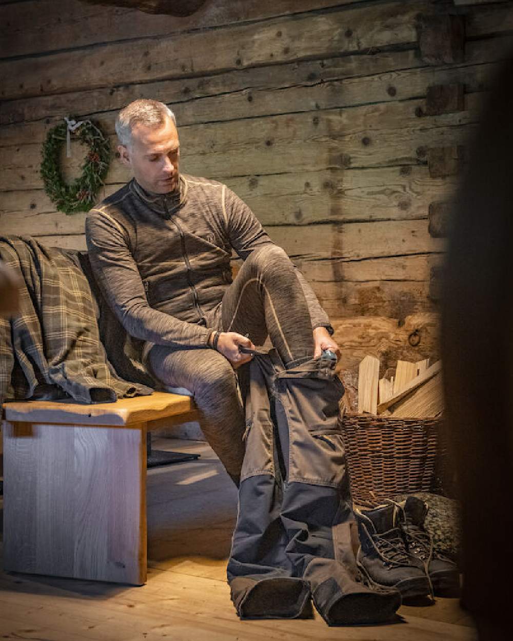 Brown Melange coloured Deerhunter Norden Fleece Jacket on wood wall background