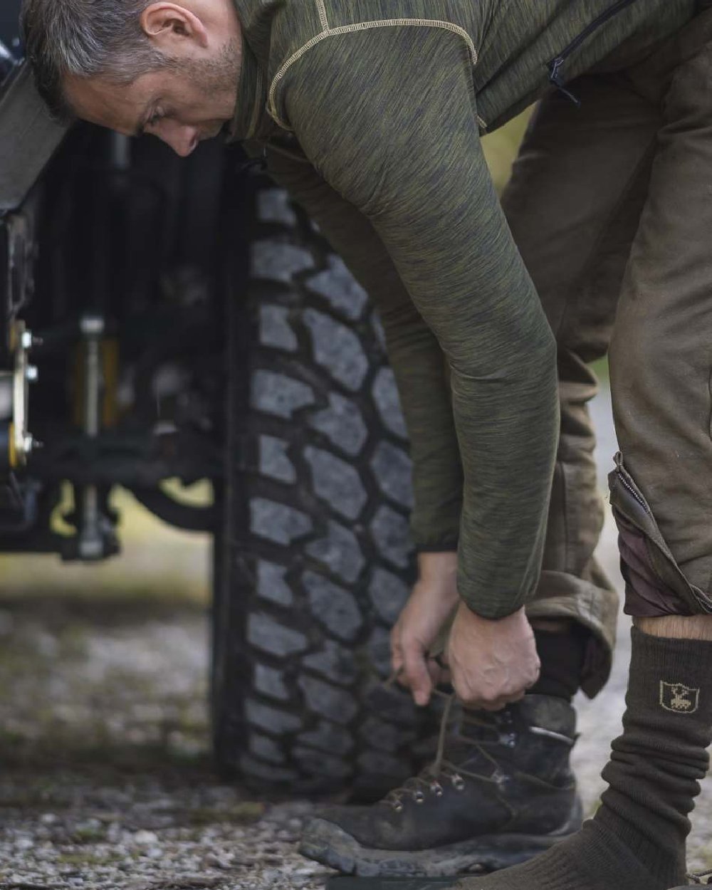 Green Melange coloured Deerhunter Norden Fleece Jacket on car background