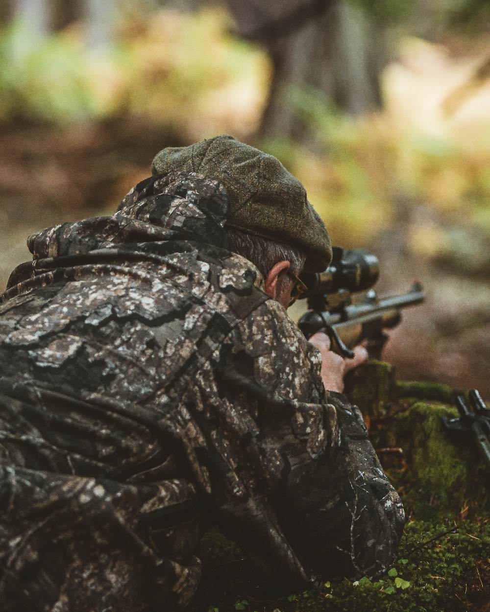 Realtree Timber Coloured Deerhunter PRO Gamekeeper Jacket on blurry background