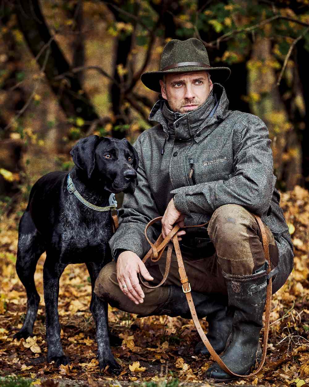 Turf Coloured Deerhunter PRO Gamekeeper Jacket on forest background