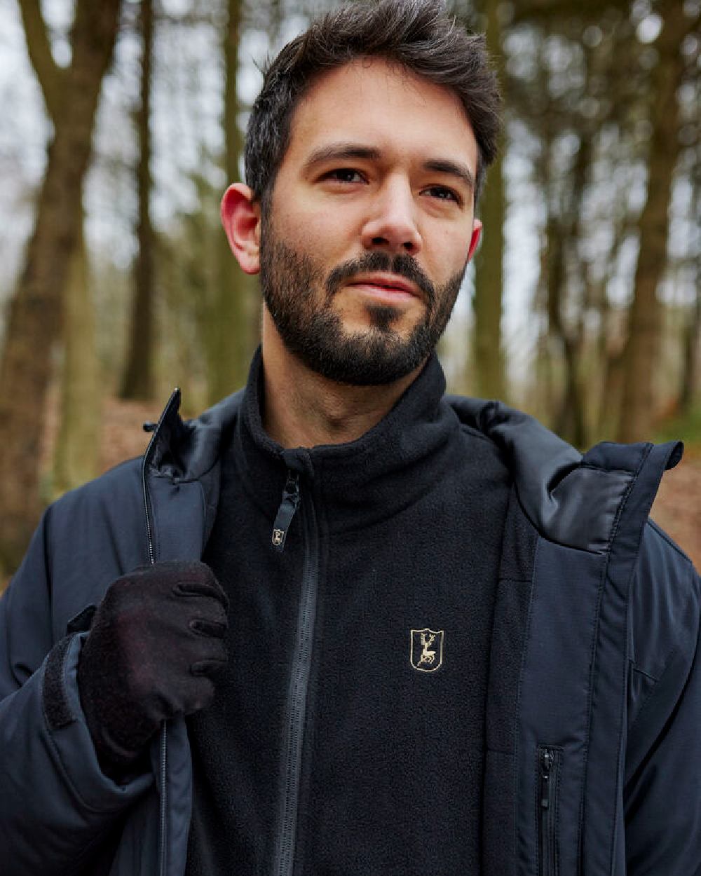 Black Oak coloured Deerhunter Quinn Merino Gloves on forest background