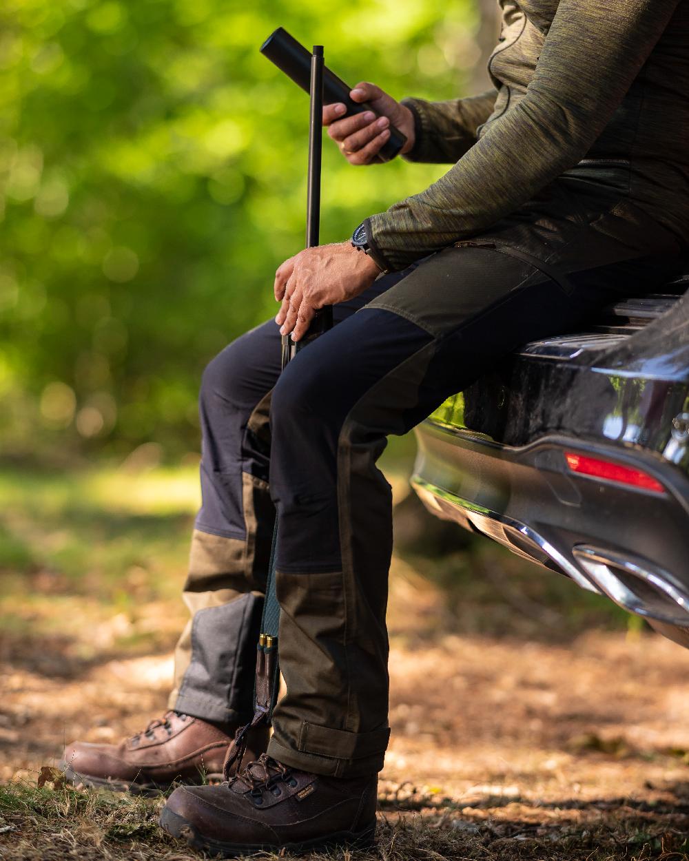 Adventure Green Coloured Deerhunter Rogaland Contrast Stretch Trousers on car background