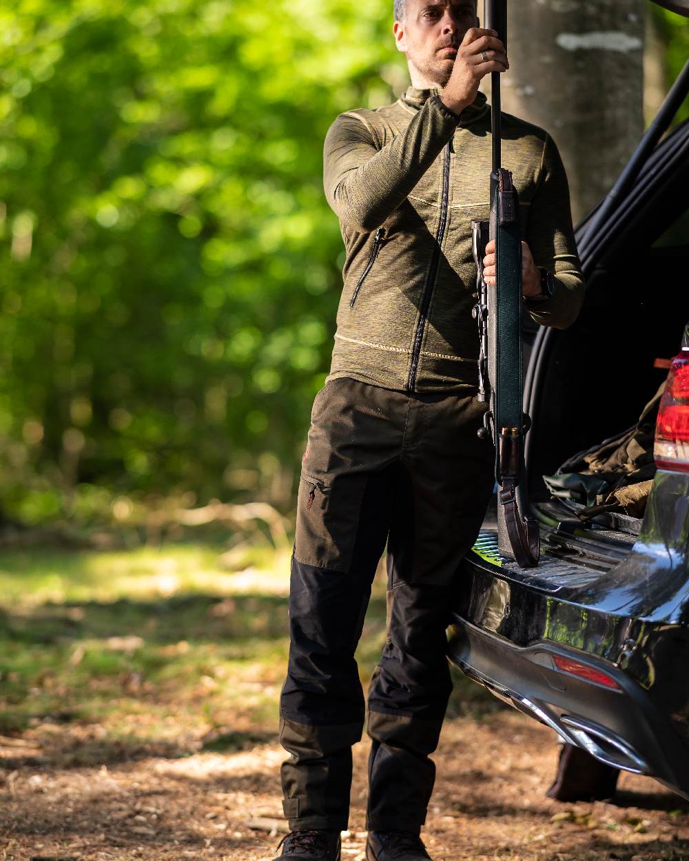 Adventure Green Coloured Deerhunter Rogaland Contrast Stretch Trousers on forest background