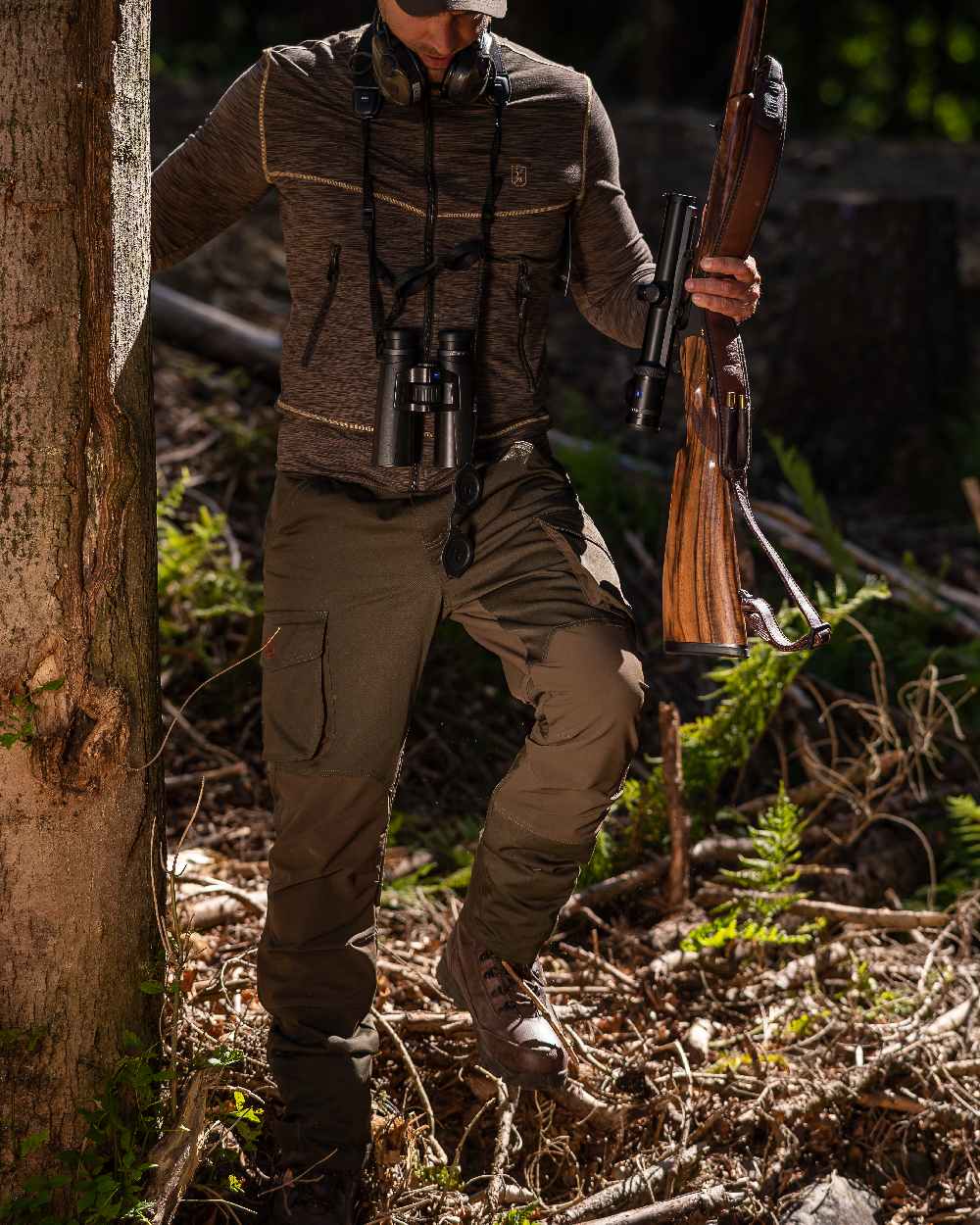 Adventure Green Coloured Deerhunter Rogaland Stretch Trousers on forest background