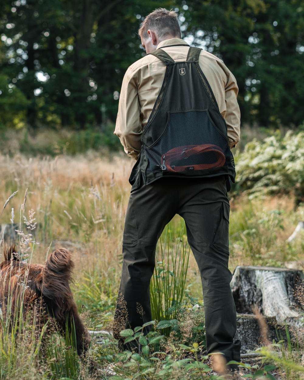 Fallen Leaf coloured Deerhunter Sarek Full Stretch Trousers on forest background