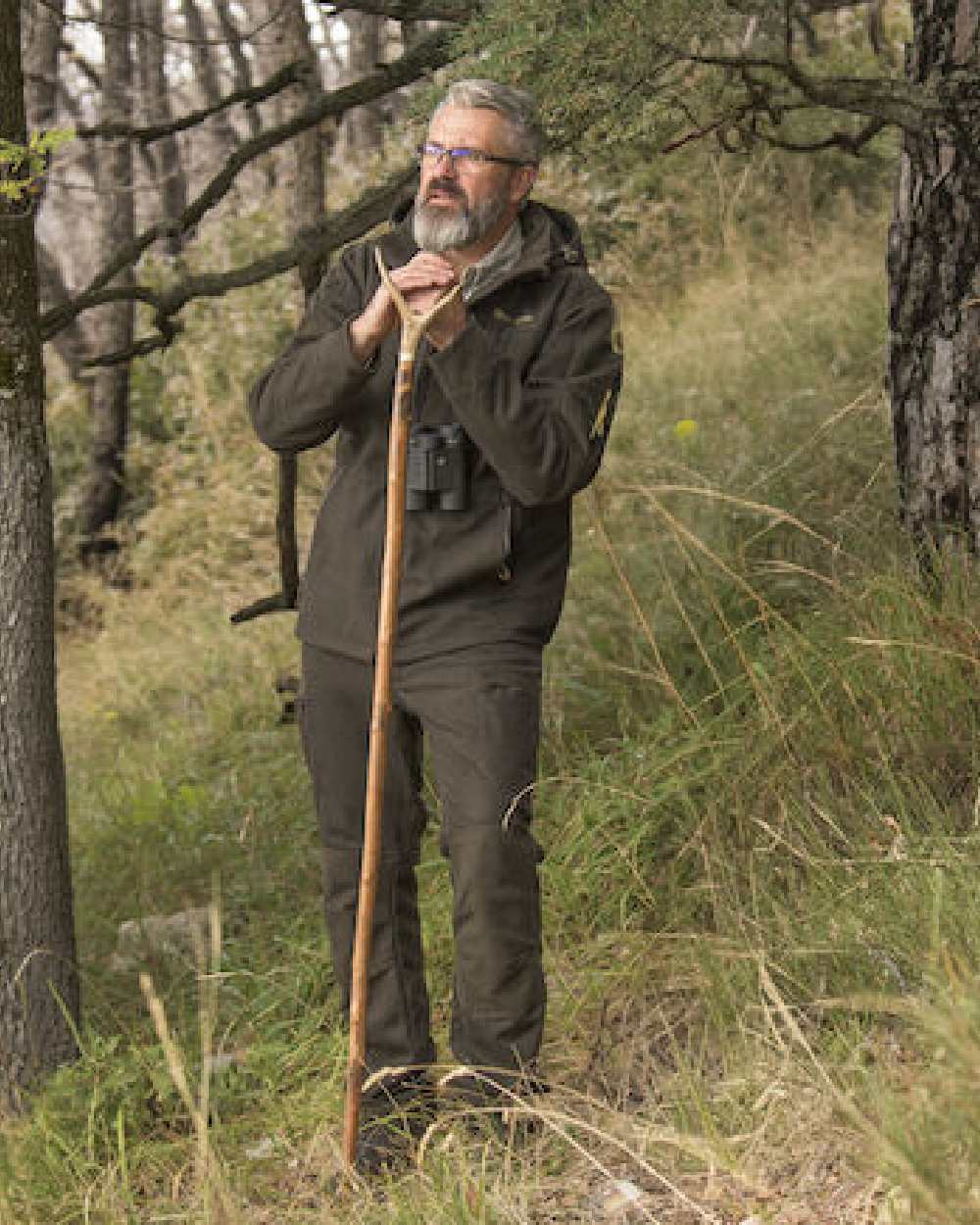 Loden Wood coloured Deerhunter Tatra Trousers on forest background