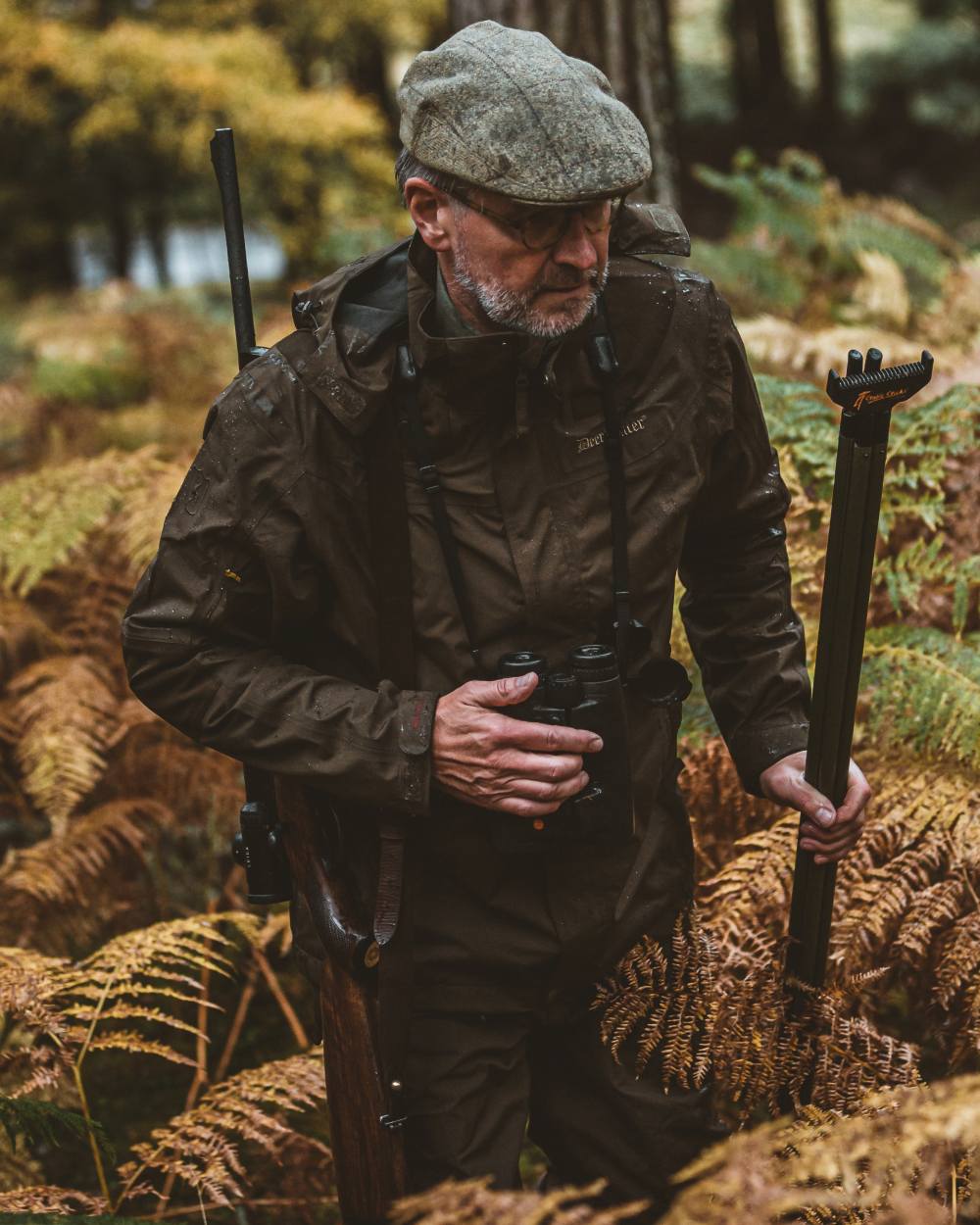 Canteen coloured Deerhunter Track Rain Jacket on forest background