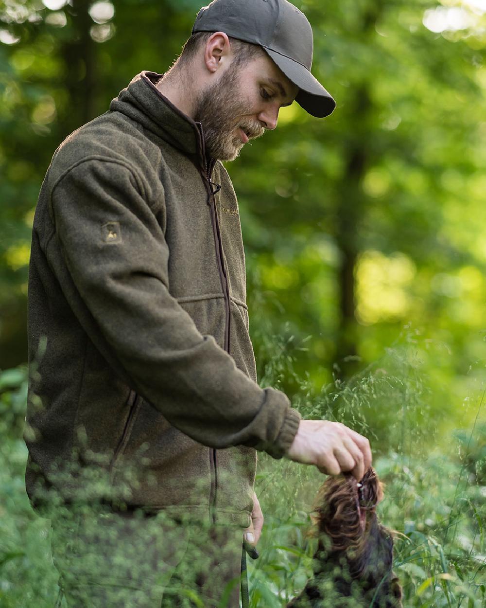 Graphite Green coloured Deerhunter Wingshooter Fleece Jacket on forest background