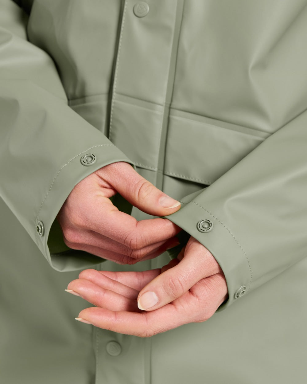 Wilted Leaf coloured Didriksons Avon Parka on white background