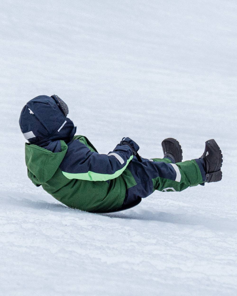 Navy Coloured Didriksons Biggles Kids Cap on outdoor background