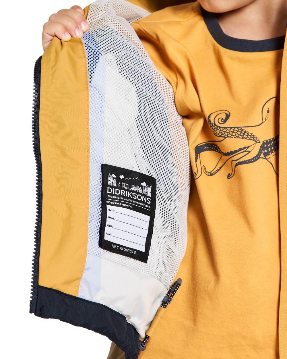 Dark Pollen coloured Didriksons Childrens Pilvi Jacket on white background