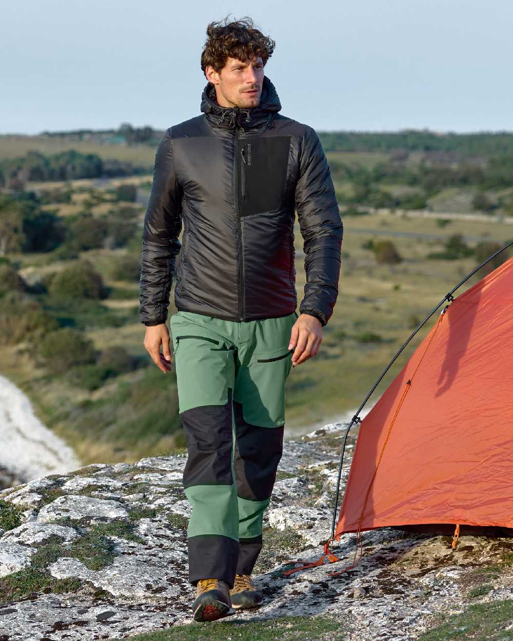 Black coloured Didriksons Mens Sander Jacket on mountain background