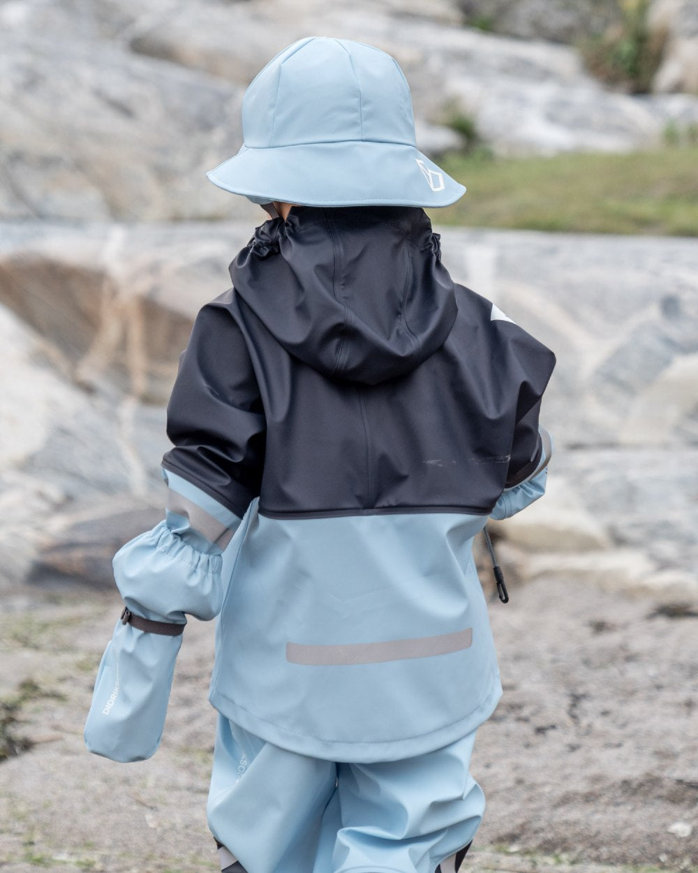 Light Sea Blue coloured Didriksons Southwest Kids Galon on sea background