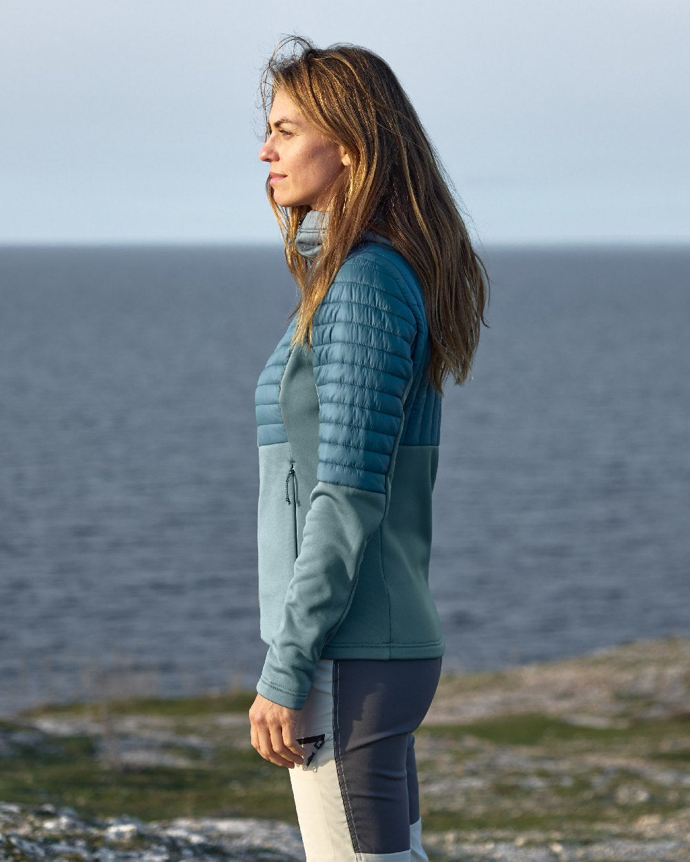 Factory Blue coloured Didriksons Womens Annema Full Zip 6 on lake background