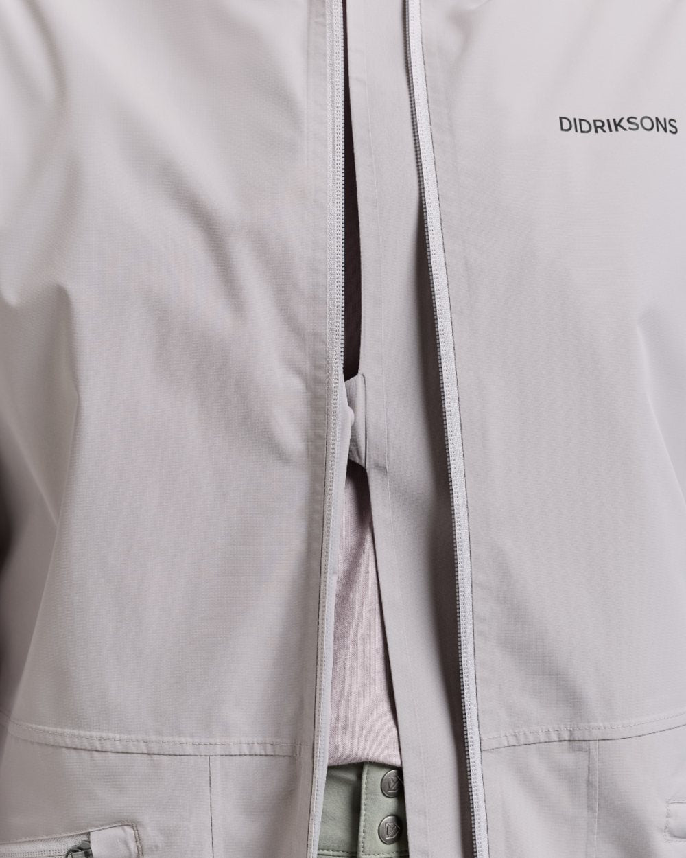 Sunrise Mist coloured Didriksons Womens Eliana Parka on white background