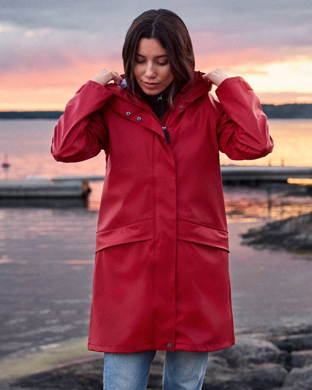 Spring Red Coloured Didriksons Womens Elly Galon Parka on outdoor background