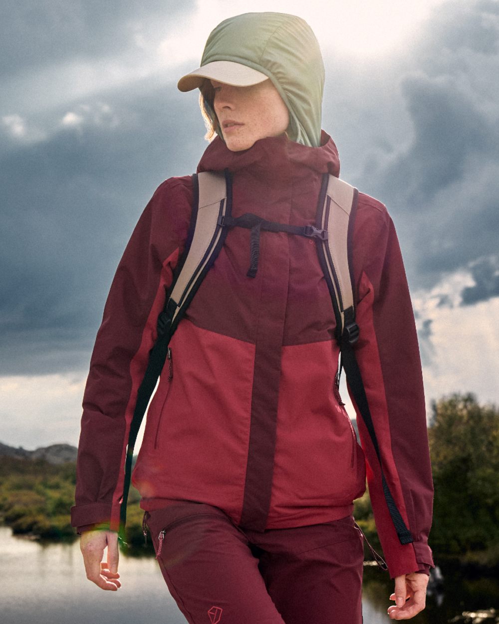 Spring Red coloured Didriksons Womens Grit Jacket 4 on sea background