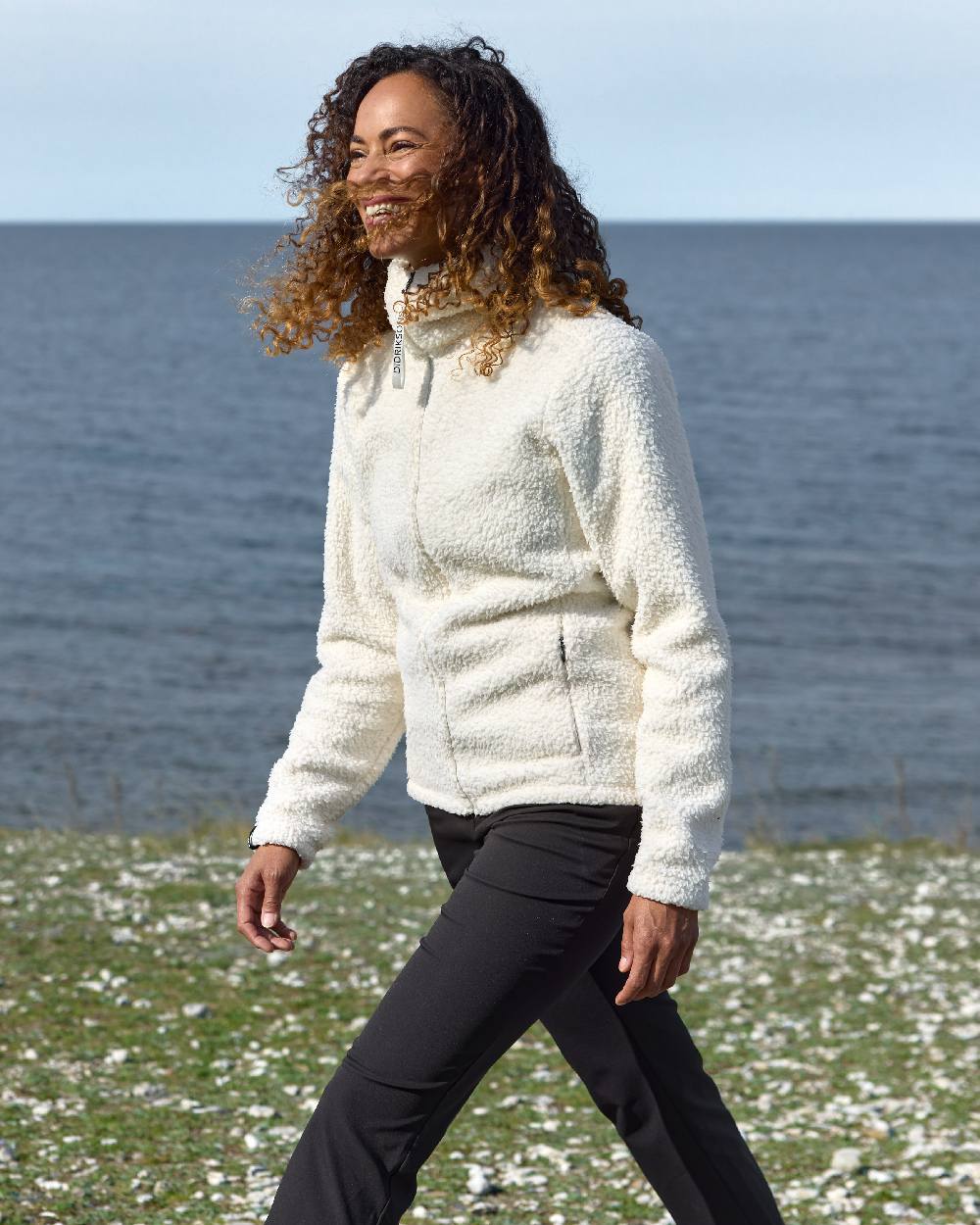 Black coloured Didriksons Womens Mary Pants on sea background