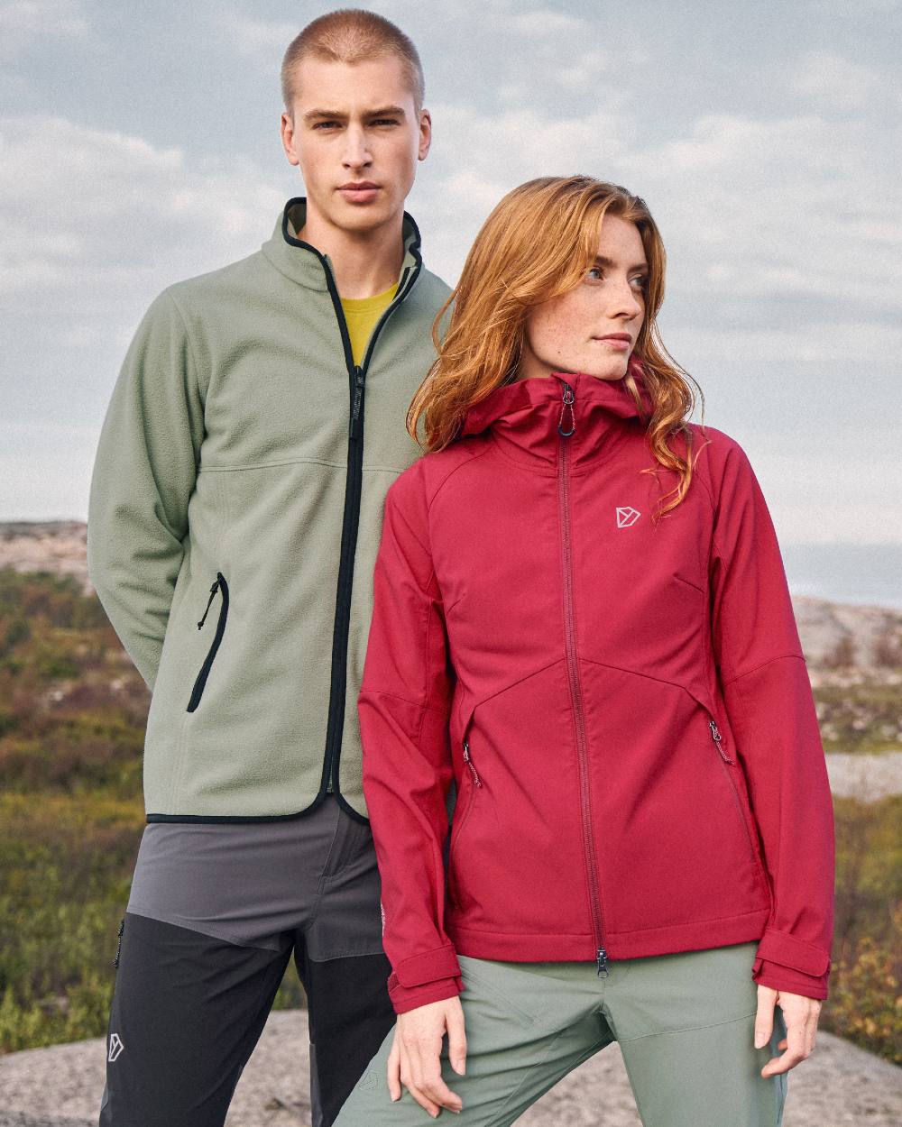 Spring Red coloured Didriksons Womens Petra Jacket on mountain background