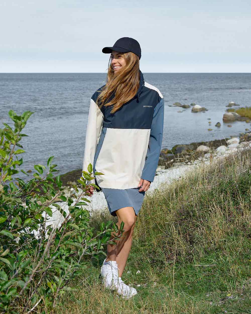True Blue Dark Blue White coloured Didriksons Womens Thyra Jacket 3 on sea background