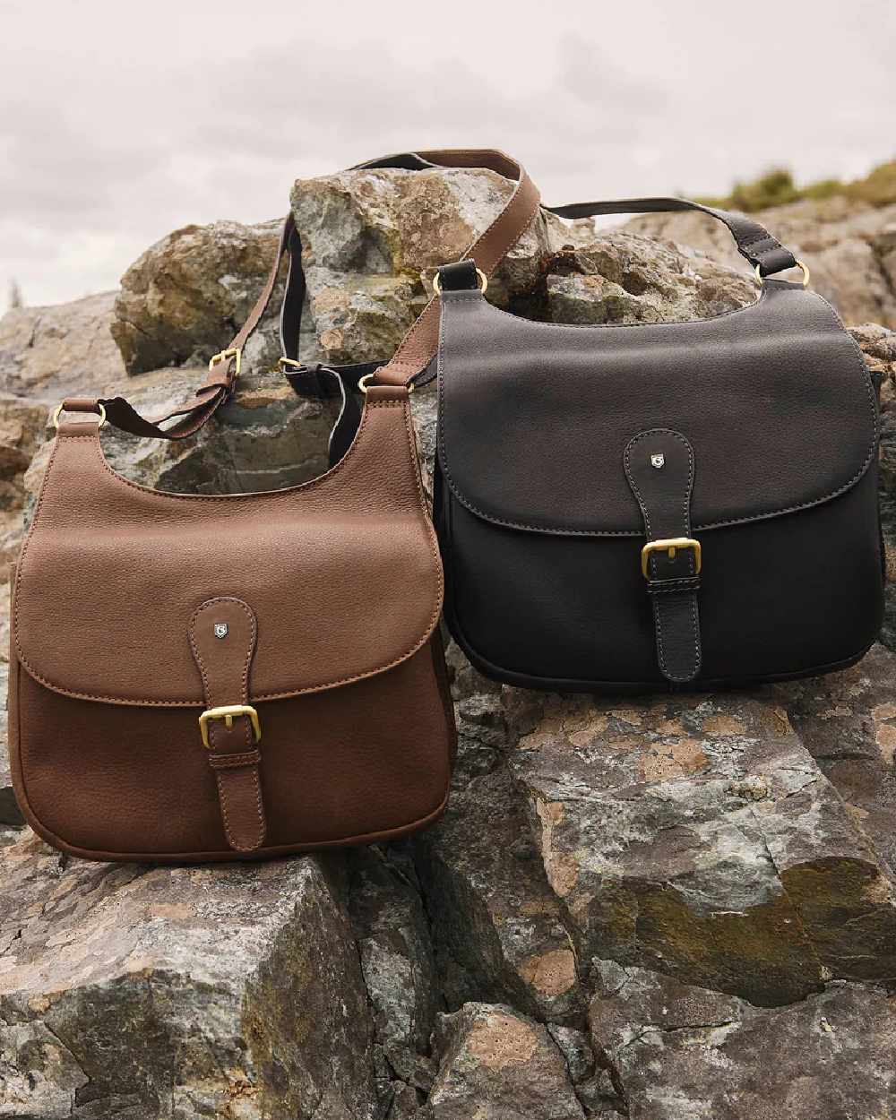 Black coloured Dubarry Balrickard Saddle Bag on rock background