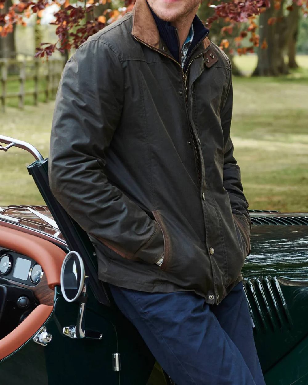 Olive Coloured Dubarry Carrickfergus Waxed Jacket on garden background