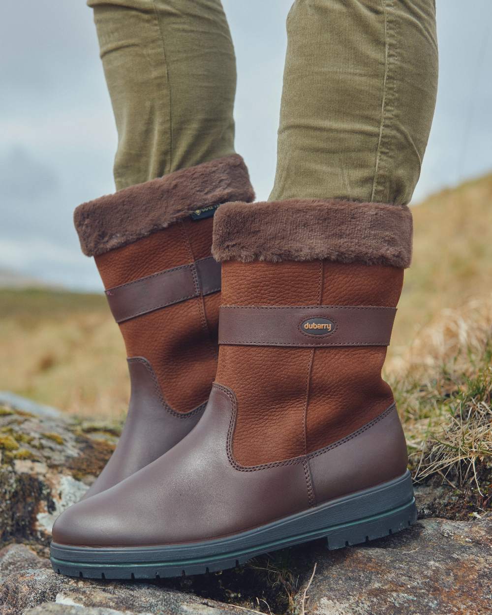 Walnut coloured Dubarry Foxrock Country Boot on grass background
