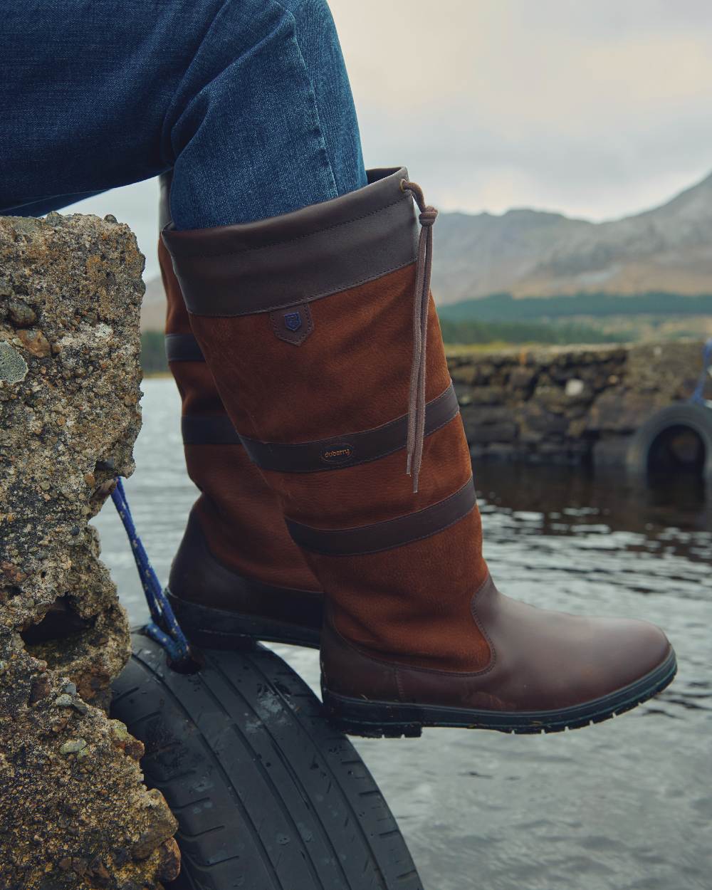 Walnut coloured Dubarry Galway Country Boots on rock background