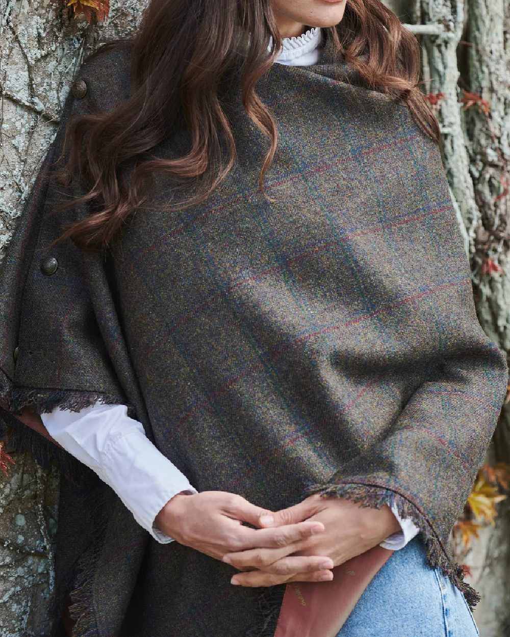 Hemlock Coloured Dubarry Hazelwood Tweed Poncho on tree background