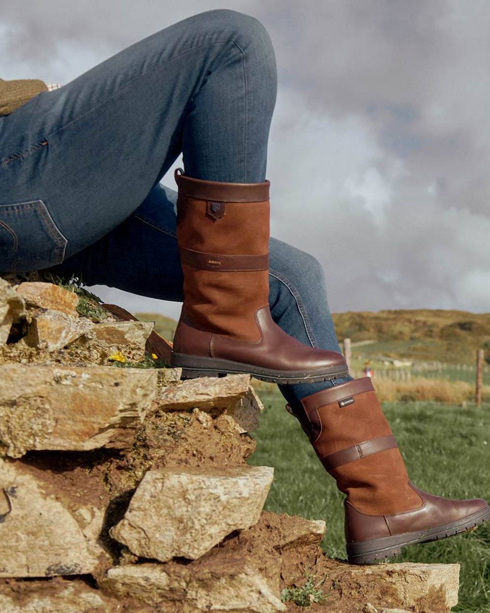 Walnut coloured Dubarry Kildare Country Boots on countryside background