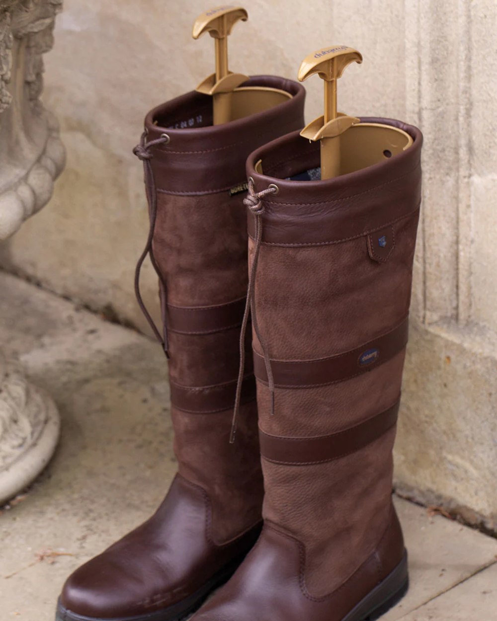 Dubarry Long Boot Tree on wall background