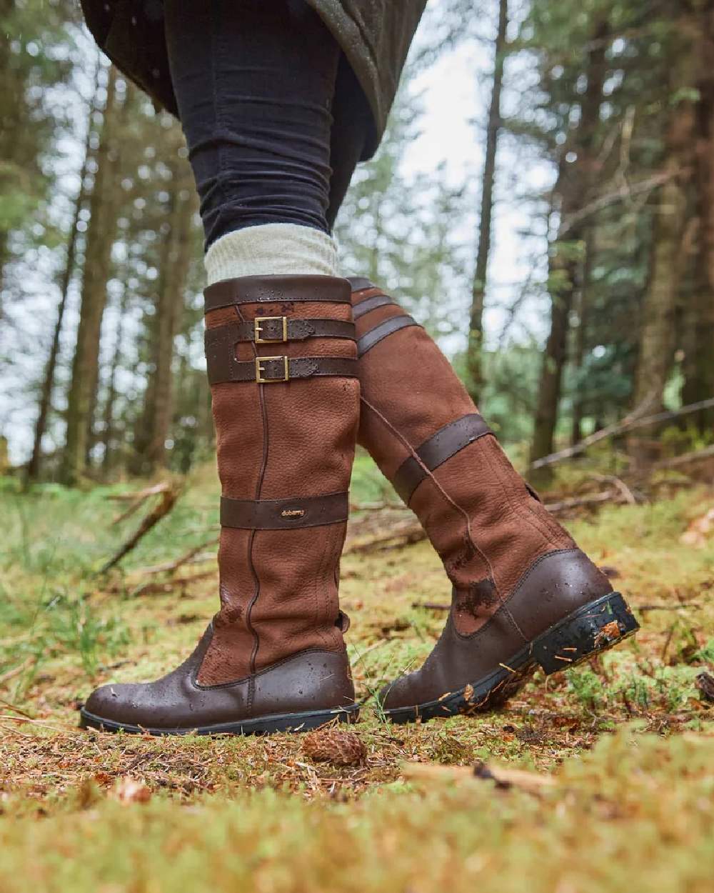 Walnut coloured Dubarry Longford Country Boots on forest background