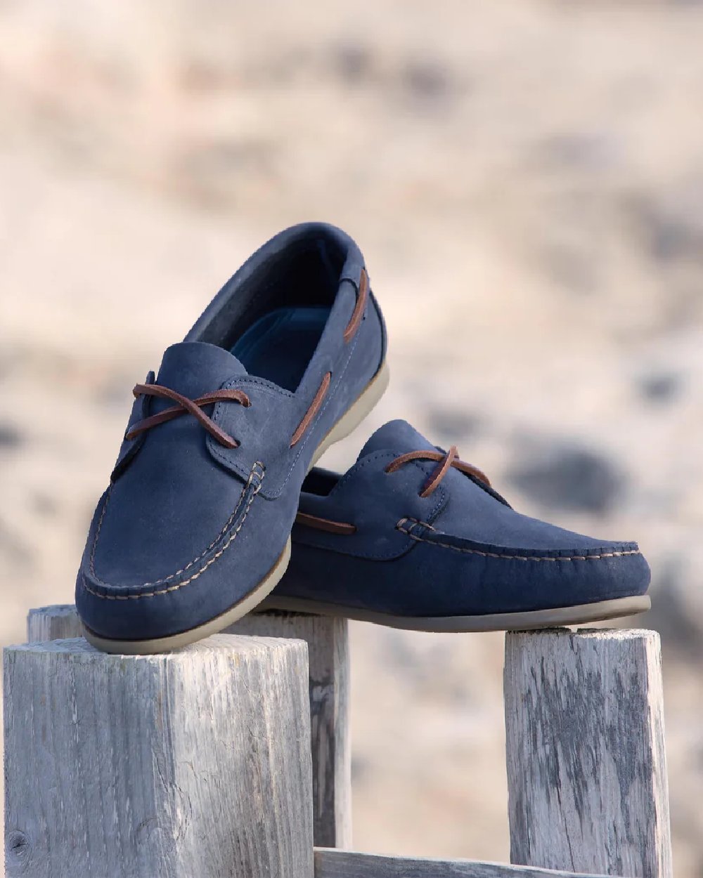 Denim coloured Dubarry Womens Aruba Deck Shoes on blurry background