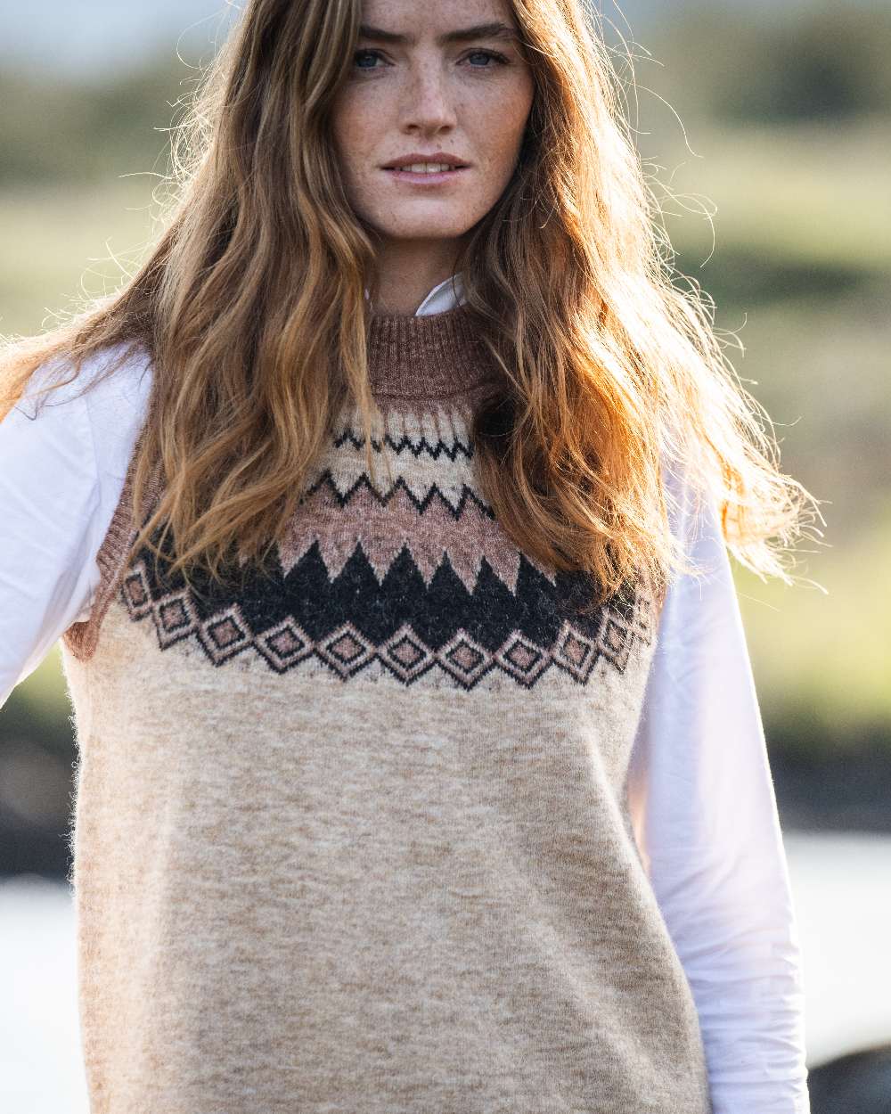 Oat Multi Coloured Dubarry Womens Doyle Fair Isle Pattern Vest on outdoor background