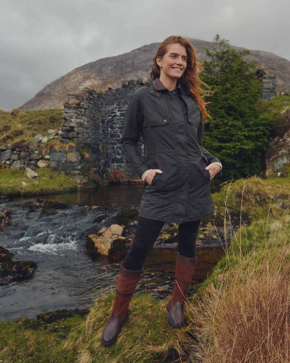 Verdigris Coloured Dubarry Womens Radford Wax Jacket on mountain background