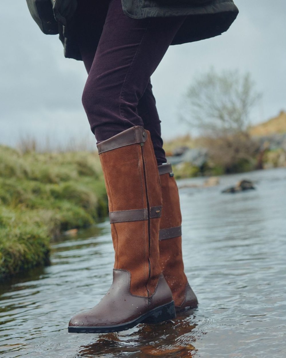 Walnut coloured Dubarry Womens Sligo Country Boots on water background