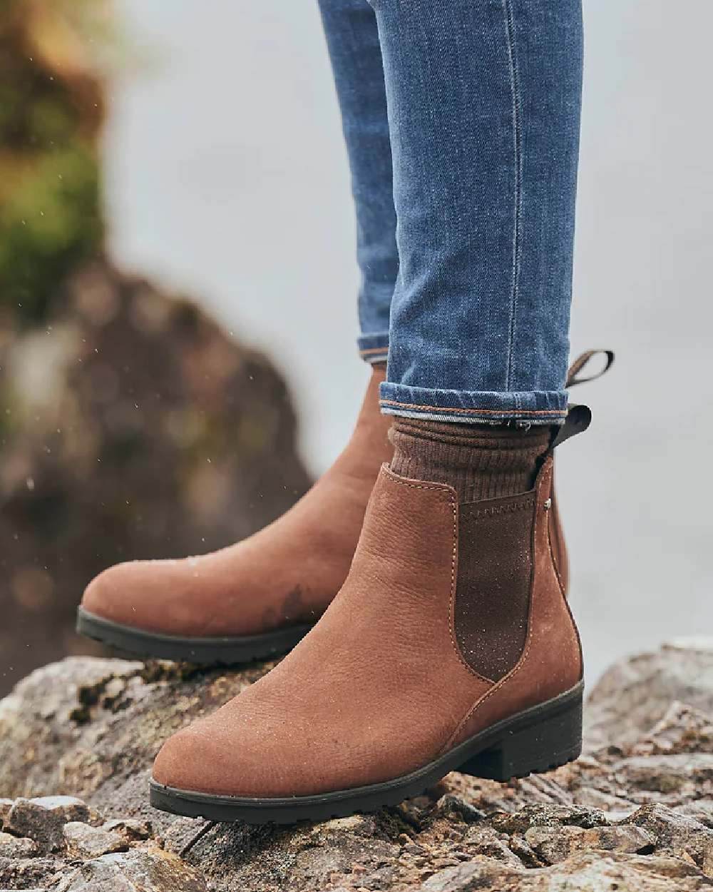 Walnut coloured Dubarry Womens Waterford Chelsea Boots on rock background
